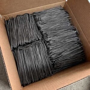 Neatly stacked garden stakes in box